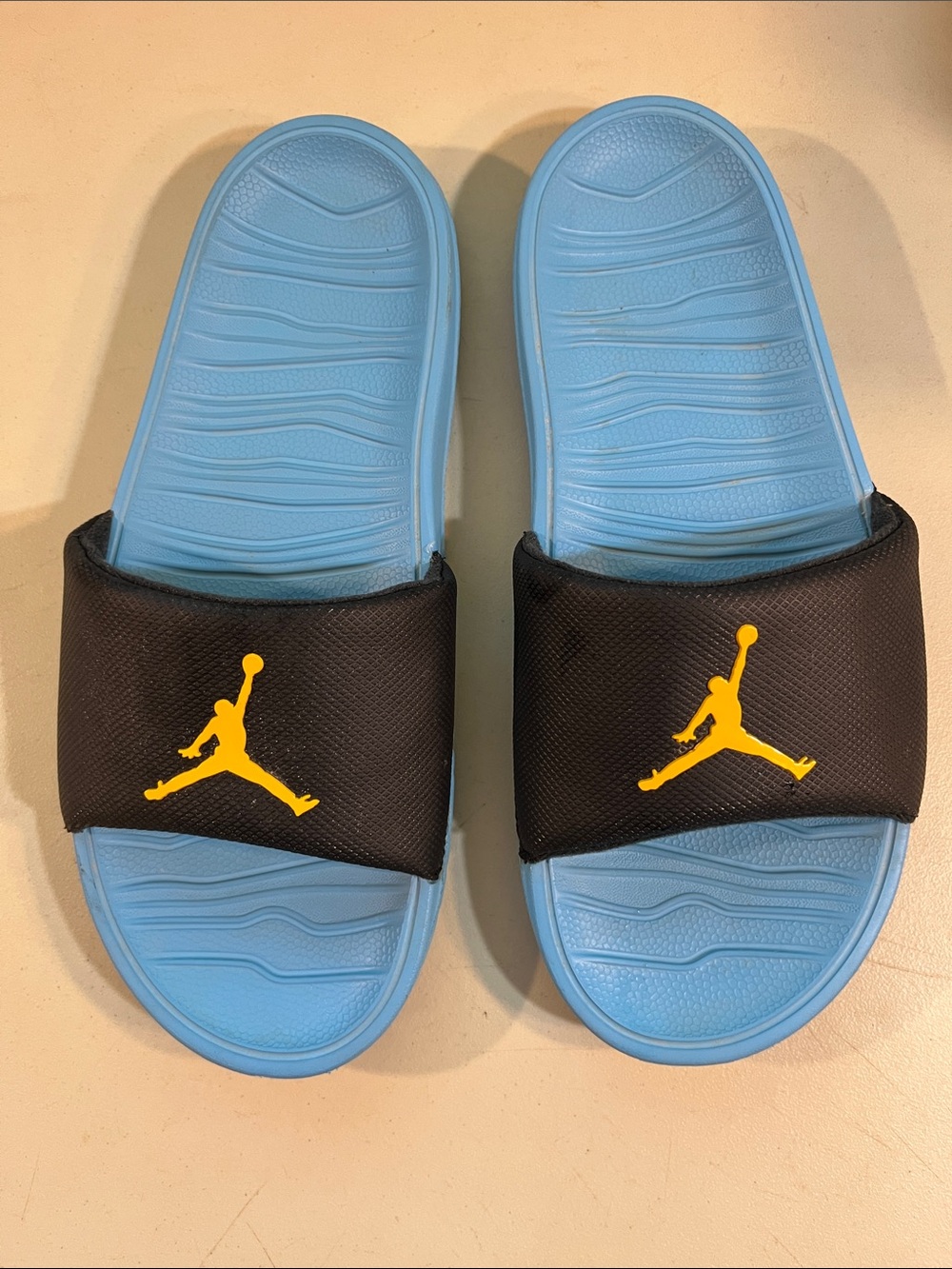Jordan Men’s Black & Light Blue Slide Sandals with Yellow Jumpman